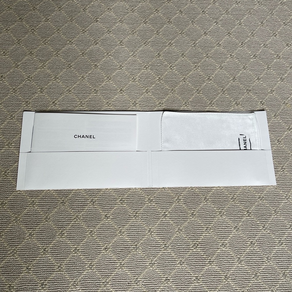Authentic CHANEL Dust Mitt in folder with Chanel booklet - New in Plastic